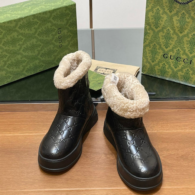 GG SNOW BOOTS IN BLACK EMBOSSED DEERSKIN AND BEIGE WOOL LINING