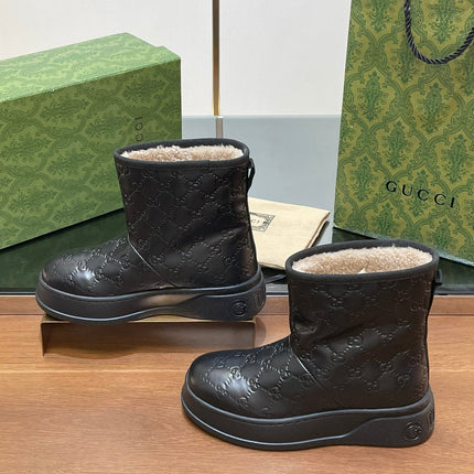 GG UGG BOOTS IN BLACK EMBOSSED DEERSKIN AND BEIGE WOOL LINING