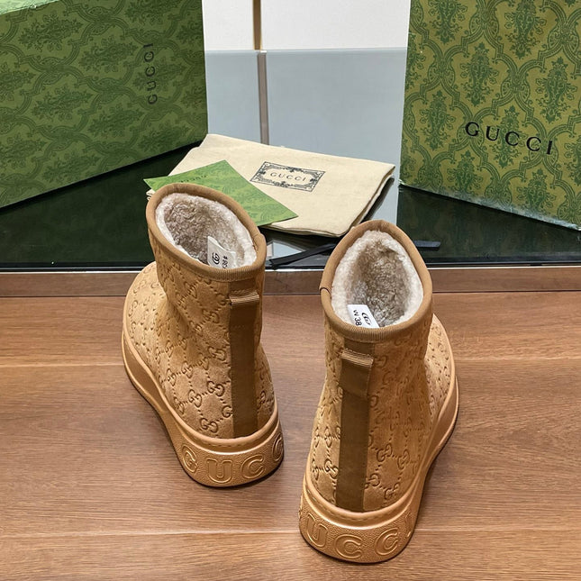 GG UGG BOOTS IN CIDER BROWN EMBOSSED SUEDE AND BEIGE WOOL LINING