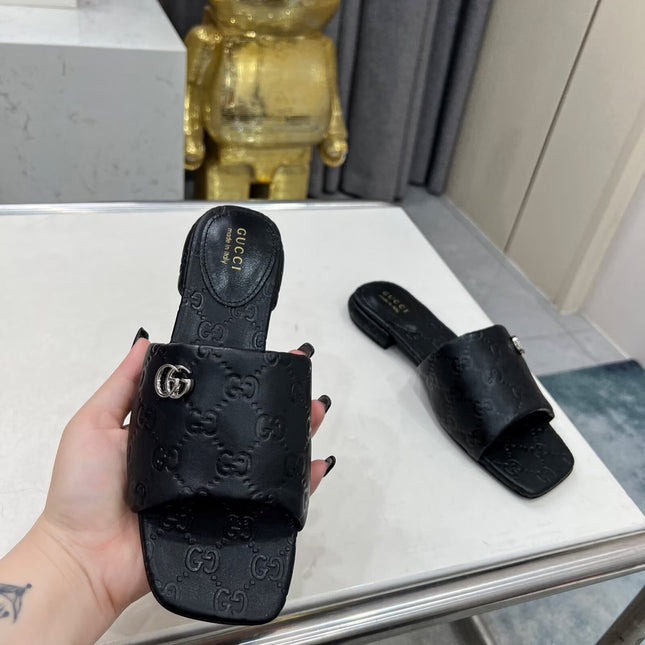 GG CASUAL SLIPPERS IN BLACK CALFSKIN LOGO EMBOSSING