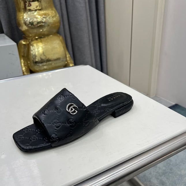 GG CASUAL SLIPPERS IN BLACK CALFSKIN LOGO EMBOSSING