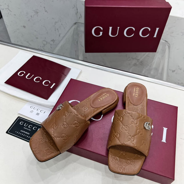 GG CASUAL SLIPPERS IN BROWN CALFSKIN LOGO EMBOSSING