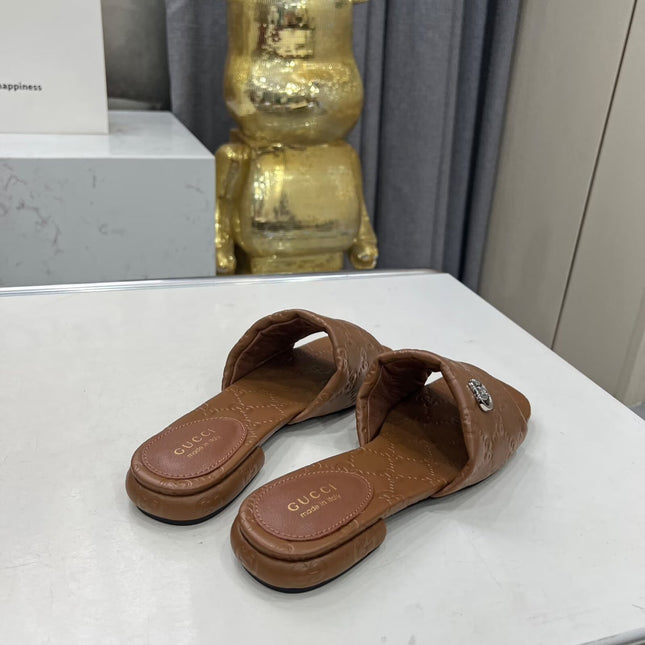 GG CASUAL SLIPPERS IN BROWN CALFSKIN LOGO EMBOSSING