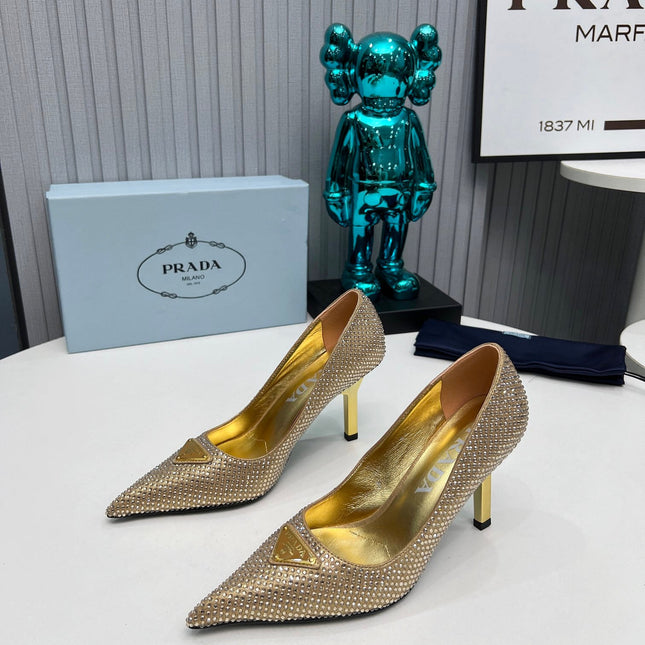 CRYSTAL HIGH-HEEL PUMPS IN GOLD SATIN WITH TRIANGLE LOGO