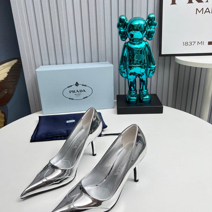 HIGH POINTED-TOE PUMPS IN SILVER GLOSSY CALFSKIN