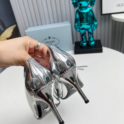 HIGH POINTED-TOE PUMPS IN SILVER GLOSSY CALFSKIN