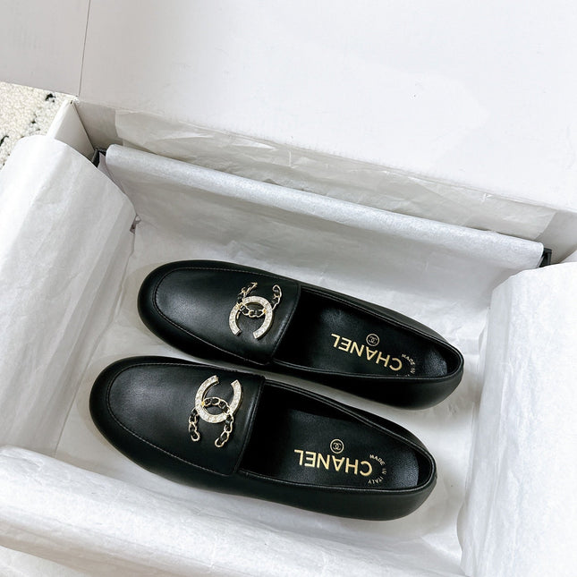 LOAFERS IN BLACK CALFSKIN HARDWARE WITH ROCK MIX CHAIN