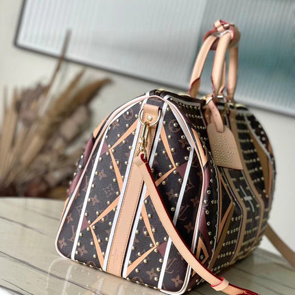 KEEPALL BANDOULIÈRE 50 IN PARFLECHE PATTERN MONOGRAM CANVAS