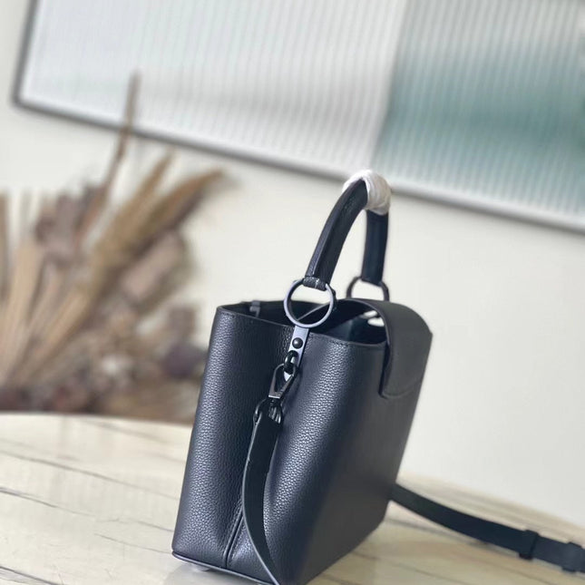 CAPUCINES EAST-WEST 27 IN BLACK TAURILLON