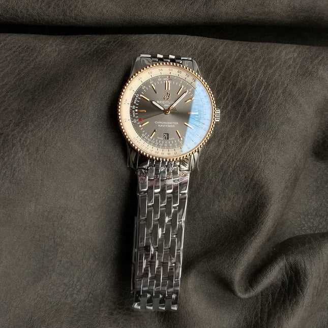 NAVITIMER AUTOMATIC 41 RED GOLD BEZEL WHITE AND BLACK DIAL