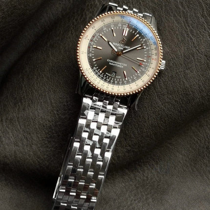 NAVITIMER AUTOMATIC 41 RED GOLD BEZEL WHITE AND BLACK DIAL