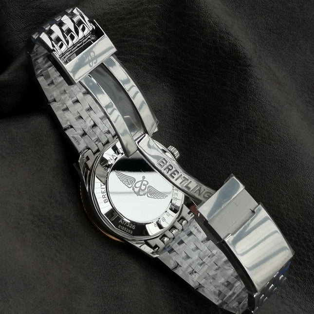 NAVITIMER AUTOMATIC 41 RED GOLD BEZEL WHITE AND BLACK DIAL