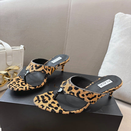 ALAIA HEELED THONG 25S 55 MM IN LEOPARD PONY HAIR LEATHER