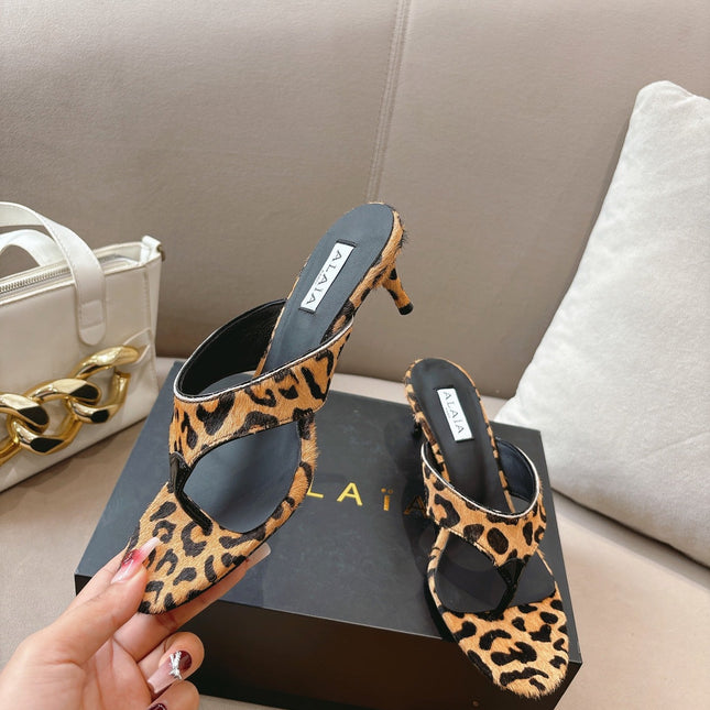 ALAIA HEELED THONG 25S 55 MM IN LEOPARD PONY HAIR LEATHER