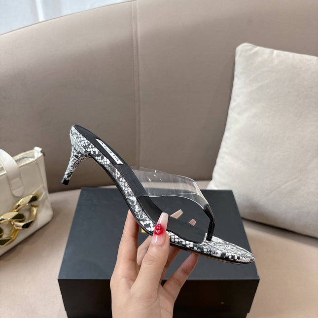 ALAIA HEELED THONG 25S 55 MM IN WHITE AND BLACK LAMBSKIN SNAKE-EMBOSSED WITH CLEAR STRAP