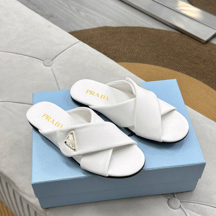 PRADA 25S SLIDE SANDALS IN WHITE CALFSKIN LOGO