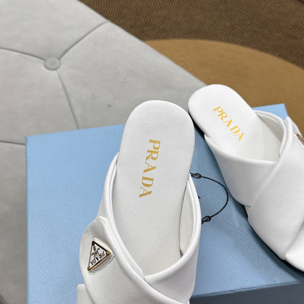 PRADA 25S SLIDE SANDALS IN WHITE CALFSKIN LOGO