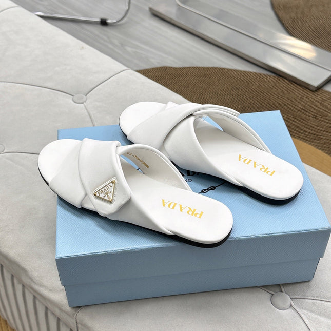 PRADA 25S SLIDE SANDALS IN WHITE CALFSKIN LOGO