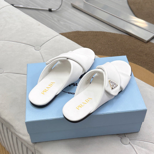 PRADA 25S SLIDE SANDALS IN WHITE CALFSKIN LOGO