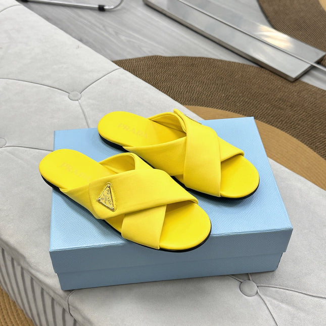 PRADA 25S SLIDE SANDALS IN YELLOW CALFSKIN LOGO