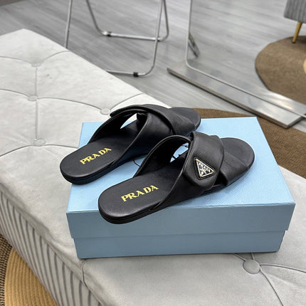 PRADA 25S SLIDE SANDALS IN BLACK CALFSKIN LOGO