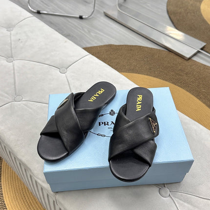 PRADA 25S SLIDE SANDALS IN BLACK CALFSKIN LOGO