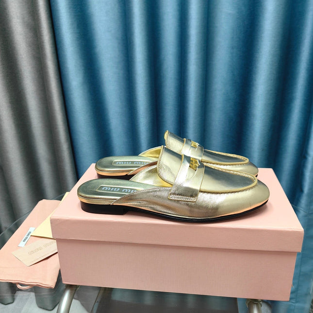 MULES SLIPPERS METALLIC GOLD COWHIDE WITH GOLD COIN