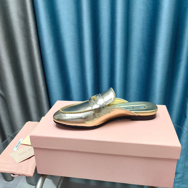 MULES SLIPPERS METALLIC GOLD COWHIDE WITH GOLD COIN