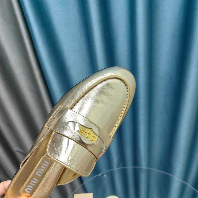 MULES SLIPPERS METALLIC GOLD COWHIDE WITH GOLD COIN