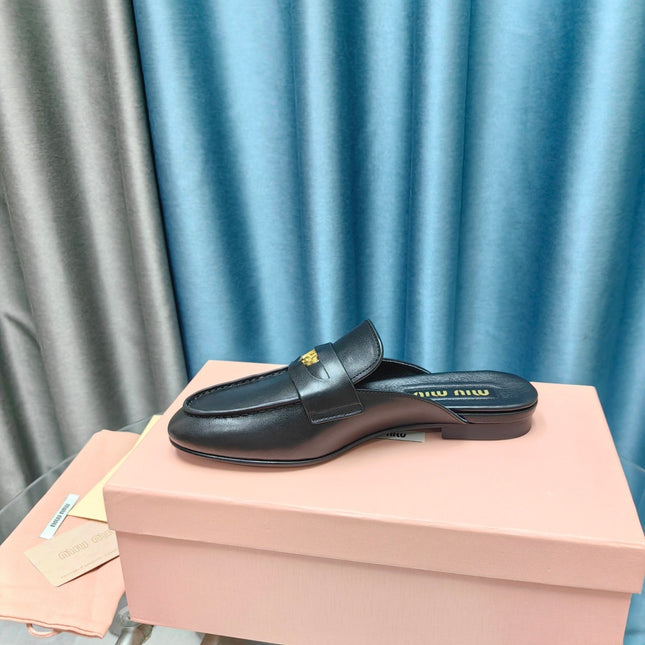 MULES SLIPPERS BLACK COWHIDE WITH GOLD COIN