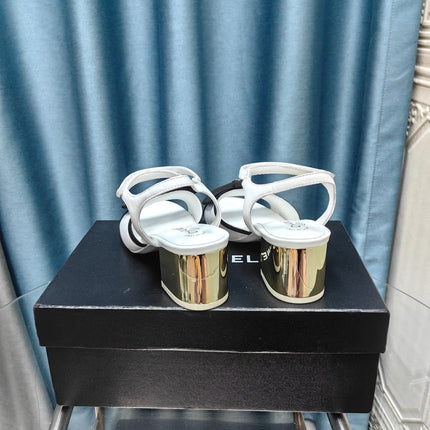 SANDALS IN WHITE SHEEPSKIN WITH BLACK SATIN BOW