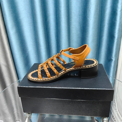 HIGH SANDALS WITH THREE STRAPS IN OCHRE YELLOW CALFSKIN