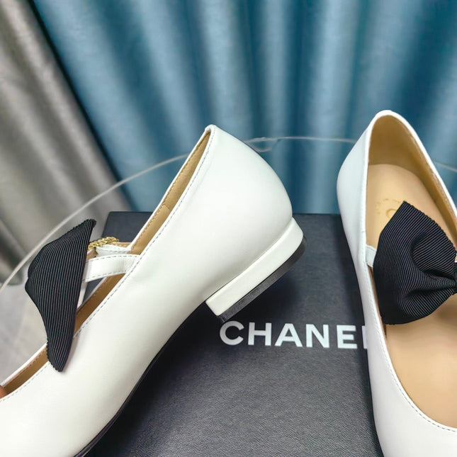 MARY JANE SHOES WHITE SHEEPSKIN WITH BLACK BOW