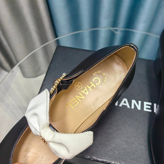 HIGH MARY JANE SHOES BLACK SHEEPSKIN WITH WHITE BOW