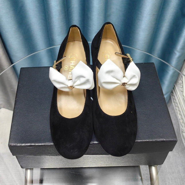 HIGH MARY JANE SHOES BLACK SUEDE WITH WHITE BOW