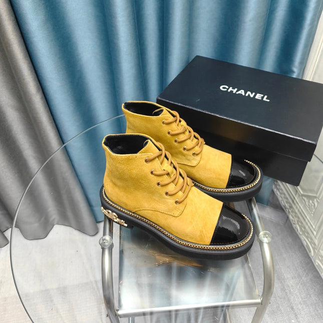 SHORT BOOTS IN GOLD YELLOW SUEDE AND BLACK SHEEPSKIN