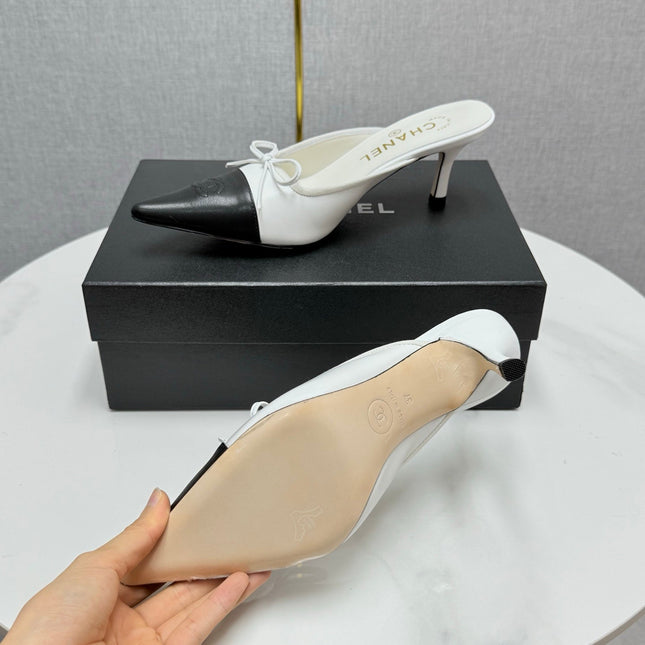 CC HEEL MULES 25S IN BLACK AND WHITE LAMBSKIN WITH BOW
