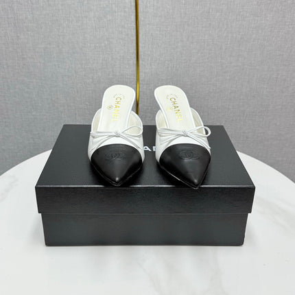 CC HEEL MULES 25S IN BLACK AND WHITE LAMBSKIN WITH BOW