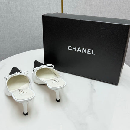 CC HEEL MULES 25S IN BLACK AND WHITE LAMBSKIN WITH BOW