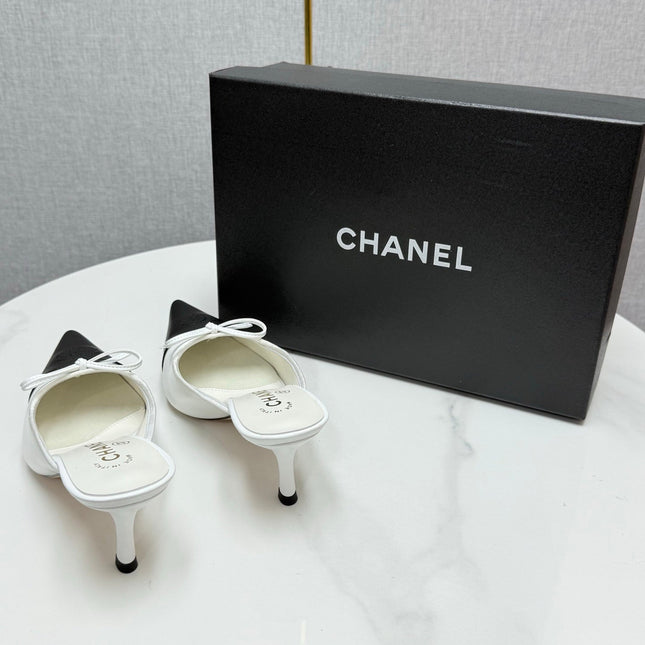 CC HEEL MULES 25S IN BLACK AND WHITE LAMBSKIN WITH BOW