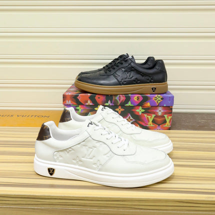 LV TRAINERS IN BLACK CALFSKIN AND BROWN RUBBER