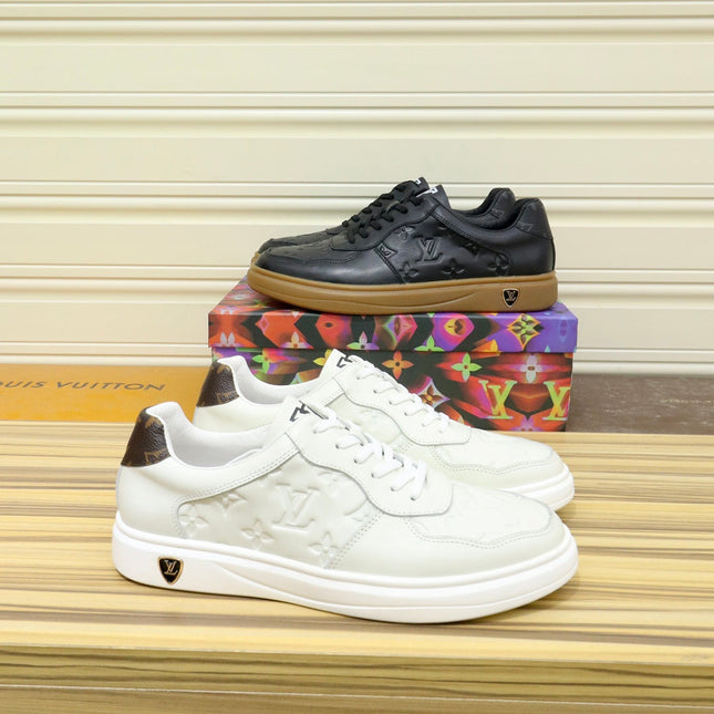 LV TRAINERS IN BLACK CALFSKIN AND BROWN RUBBER
