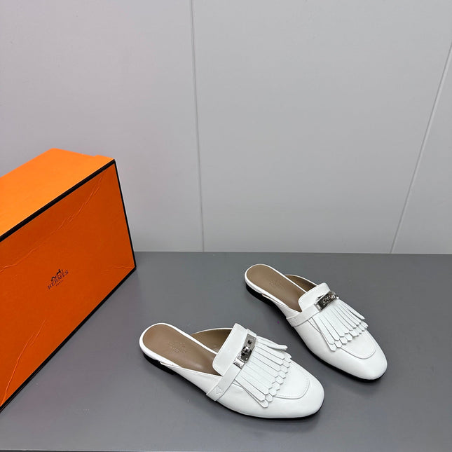 0Z MULE IN WHITE LAMBSKIN WITH FRINGE DETAIL