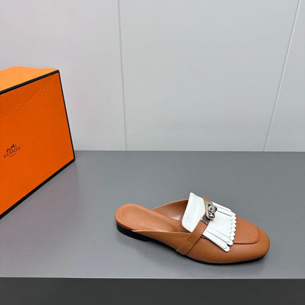 0Z MULE IN BRONZE BROWN LAMBSKIN WITH WHITE FRINGE DETAIL