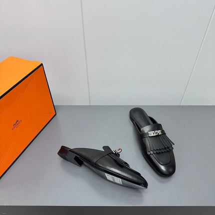 0Z MULE IN BLACK LAMBSKIN WITH FRINGE DETAIL