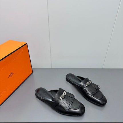 0Z MULE IN BLACK LAMBSKIN WITH FRINGE DETAIL