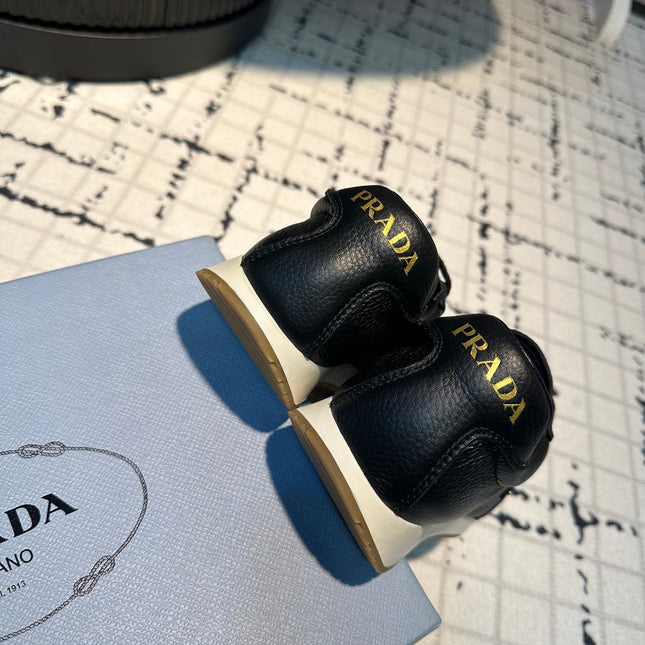 PRA TRIANGLE LOGO SNEAKERS BLACK CALFSKIN