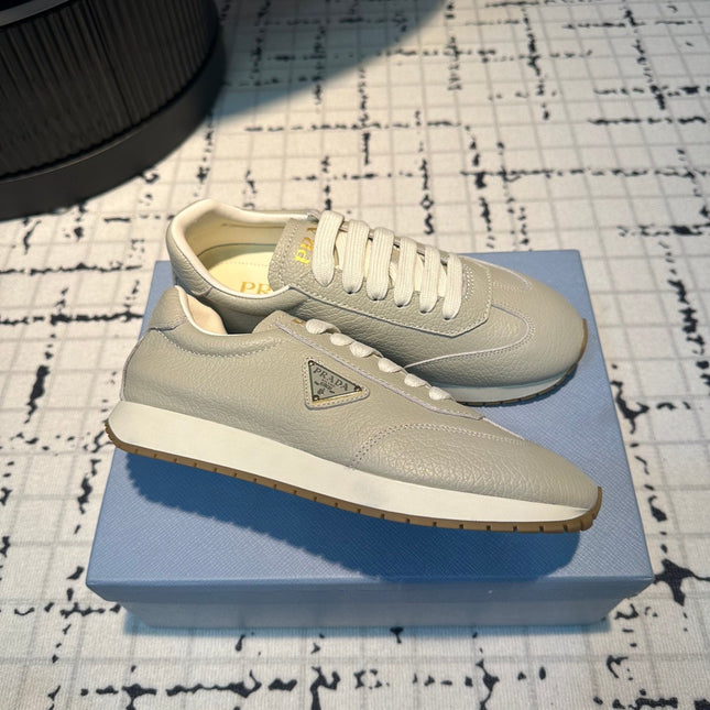PRA TRIANGLE LOGO SNEAKERS LIGHT GRAY CALFSKIN
