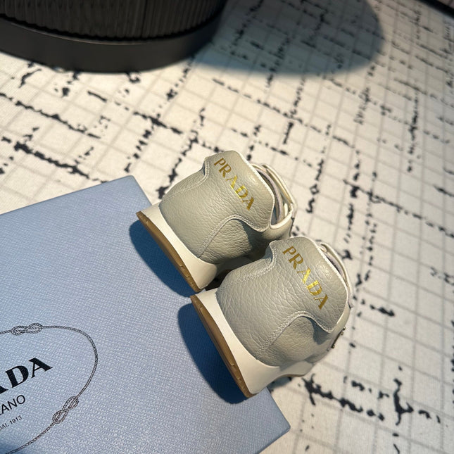 PRA TRIANGLE LOGO SNEAKERS LIGHT GRAY CALFSKIN