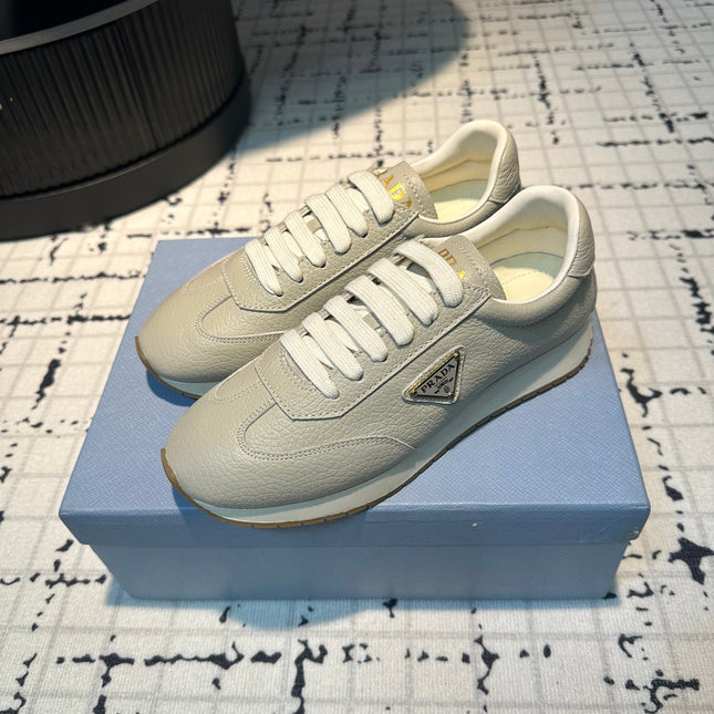 PRA TRIANGLE LOGO SNEAKERS LIGHT GRAY CALFSKIN